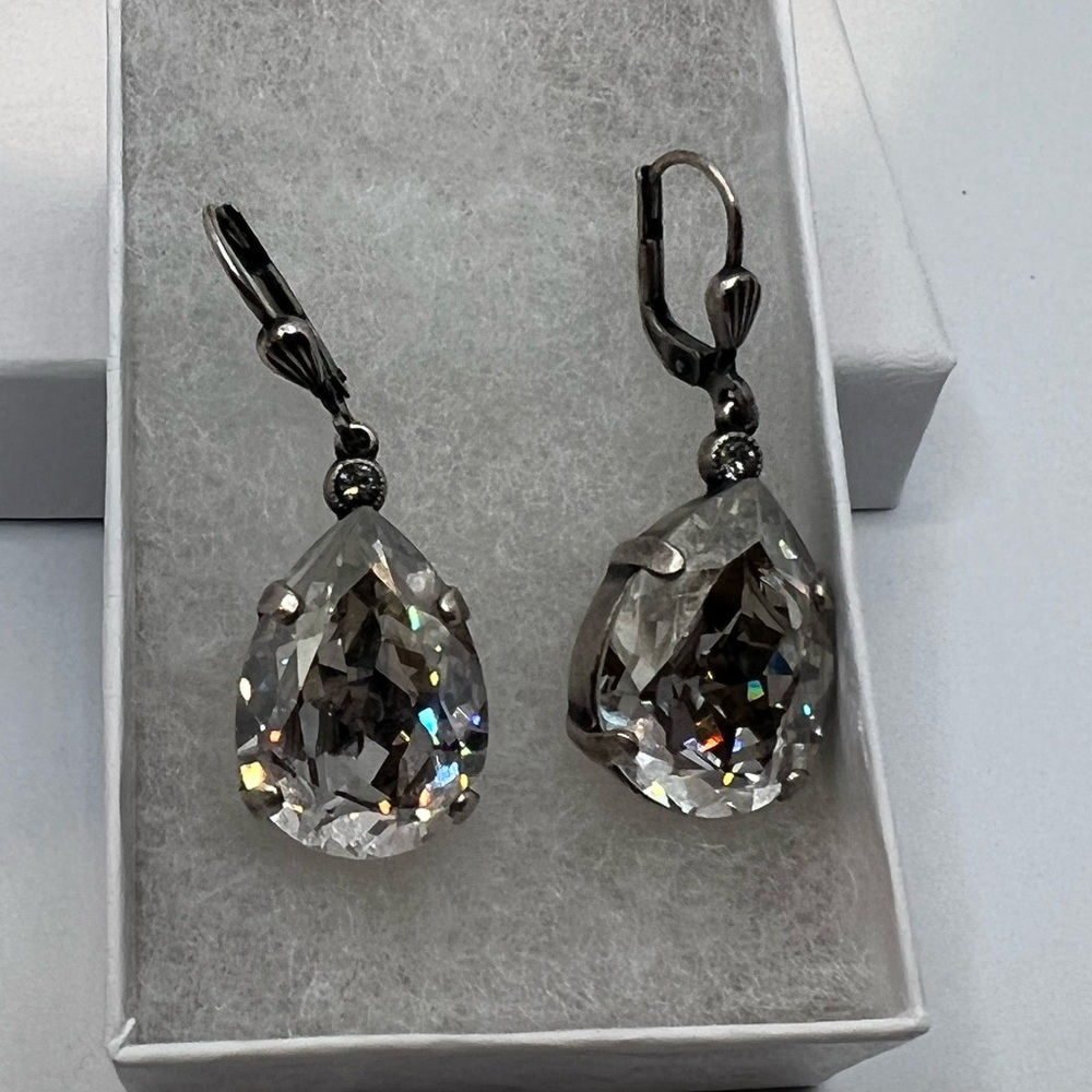 Oversized crystalline stone drop earrings.